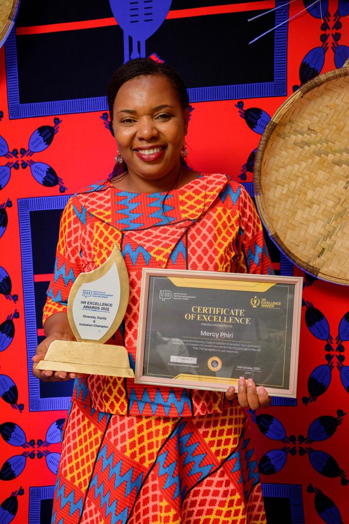Mercy Phiri receiving IPMM award